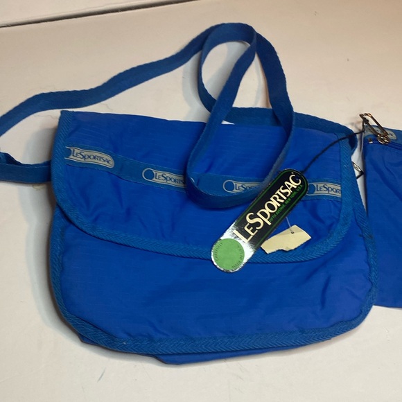 Lesportsac Handbags - Vintage NWT LeSportsac Blue bag with pouch